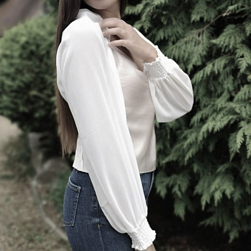 Cream bolero style sleeve in sheer fabric to cover your arms
